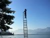 Figure at the top of a ladder illustrating skills for career progression, online learning