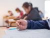 Students sitting a traditional in-person exam