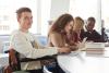 University student in wheelchair in study group