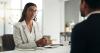 A young woman interviews for a job
