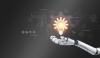 A robot hand holds out a glowing lightbulb