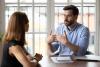 A student and an assessor roleplaying a client meeting