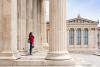 Young woman outside Athenian Academy