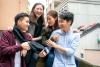 Students laugh together