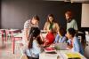 Students work together in a classroom