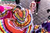 Indigenous Mexican women dressed in colourful traditional clothes