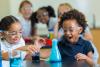 Two primary school students doing a science experiment