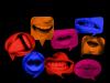 Colourful speech bubbles with photos of mouths against a black background