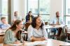 Students laugh in a classroom