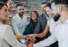 University staff clasp hands in a show of solidarity